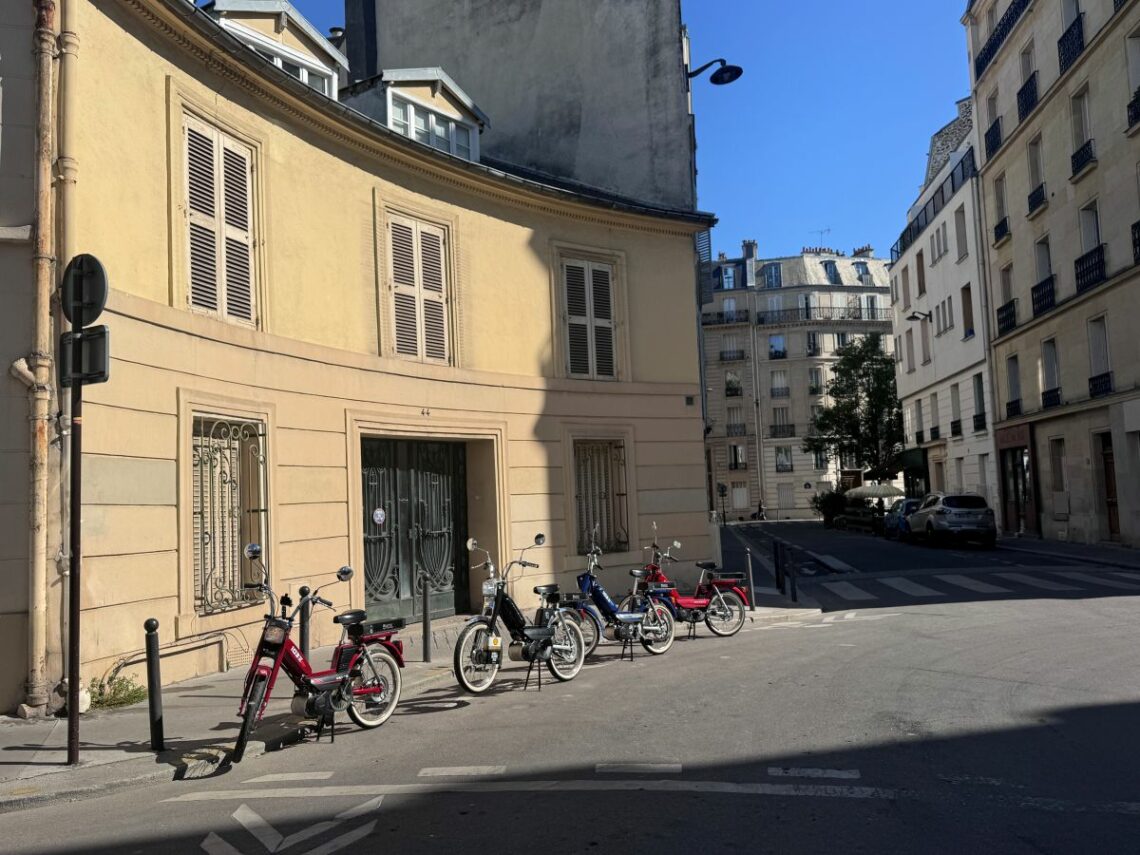 The vintage mopeds parked in the fourteenth arrondissement.